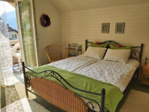 Кровать или кровати в номере Apartments Green Paradise