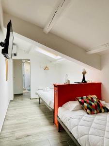 Кровать или кровати в номере RESIDENZA 8