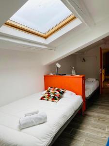 Кровать или кровати в номере RESIDENZA 8