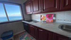 a kitchen with a counter top and a window at Casa Camilo I in Valle Gran Rey