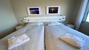 a bedroom with a bed with two pillows on it at Casa Camilo I in Valle Gran Rey