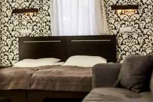 Postel nebo postele na pokoji v ubytování Hotton Hotel