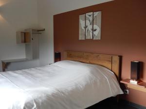 Voodi või voodid majutusasutuse Gîte du Moulin - Rose toas