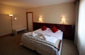 Postel nebo postele na pokoji v ubytování Trakya City Hotel