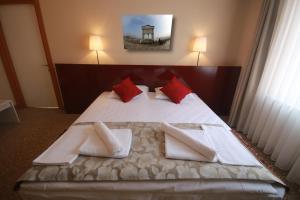 Postel nebo postele na pokoji v ubytování Trakya City Hotel