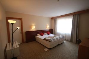 Postel nebo postele na pokoji v ubytování Trakya City Hotel