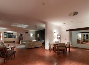 Uma área de estar em Parador de Málaga Golf