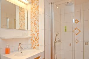 Koupelna v ubytování Gartenhotel Feldeck