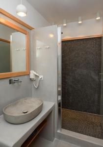 Kúpeľňa v ubytovaní Theasis Suites