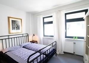 Katil atau katil-katil dalam bilik di Ferienwohnung KLÜN's