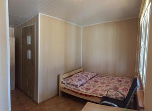 Łabędź I Domki nad jeziorem客房内的一张或多张床位