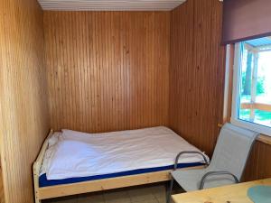 Łabędź I Domki nad jeziorem客房内的一张或多张床位