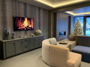 TV a/nebo společenská místnost v ubytování Aspen Square Condominium Hotel
