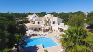 an aerial view of a house with a swimming pool at Villa Tulum by Algarve Vacation in Almancil