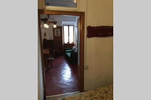 Ein Sitzbereich in der Unterkunft Nel set di piccolo mondo antico Villa Viola