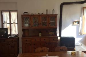 TV/Unterhaltungsangebot in der Unterkunft Nel set di piccolo mondo antico Villa Viola