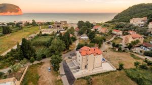 an aerial view of a small town next to the ocean at Luxury Apartments Queen in Petrovac na Moru