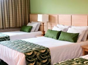 Postel nebo postele na pokoji v ubytování Thermas All Inclusive Resort Poços de Caldas By Nacional Inn