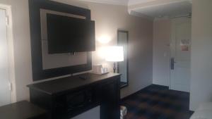 A television and/or entertainment centre at REGENCY INN & SUITES