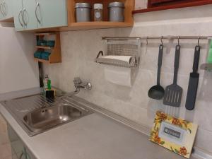 Een keuken of kitchenette bij DR Apartment