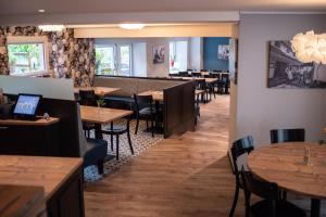 Un restaurante o sitio para comer en Hotel Gerig