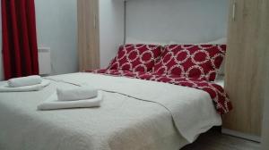 Postel nebo postele na pokoji v ubytování apartmani Zoran Bilić