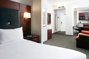 Кровать или кровати в номере Club Quarters Hotel Faneuil Hall, Boston