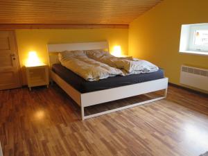 Postel nebo postele na pokoji v ubytování Holiday House Koceri