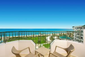 a view of the beach from the balcony of a resort at Iberostar Selection Royal El Mansour in Mahdia