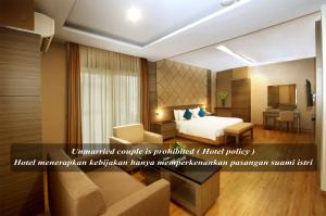 Postel nebo postele na pokoji v ubytování Hotel Gren Alia Cikini