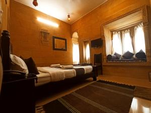 TV a/nebo společenská místnost v ubytování Hotel Royal Haveli