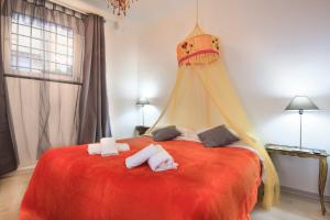 Postel nebo postele na pokoji v ubytování B&B Ventisei Scalini A Trastevere