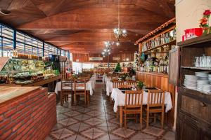 Restoran või mõni muu söögikoht majutusasutuses Pousada Trilha da Serra