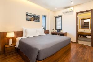 Postel nebo postele na pokoji v ubytování Avenis Hotel