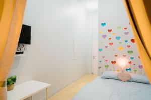 Postel nebo postele na pokoji v ubytování Ministry Homestay
