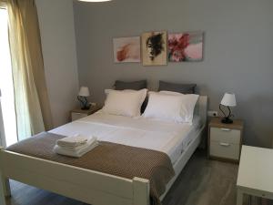 Postel nebo postele na pokoji v ubytování Villa Tranquilita