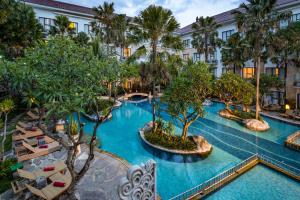 an overhead view of a pool at a hotel at Truntum Kuta Formerly Grand Inna Kuta in Kuta