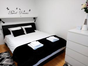Postel nebo postele na pokoji v ubytování Deluxe Apartment MyPlace