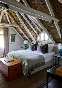 Postel nebo postele na pokoji v ubytování La Clé Lodge