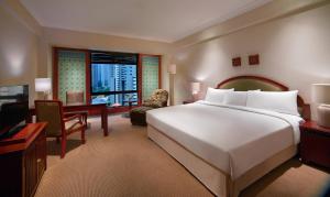 Postel nebo postele na pokoji v ubytování The Sultan Hotel & Residence Jakarta