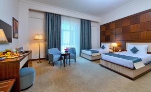 Postel nebo postele na pokoji v ubytování Gewan Hotel Cairo