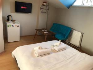 Μια τηλεόραση ή/και κέντρο ψυχαγωγίας στο Zion Home Butik Otel