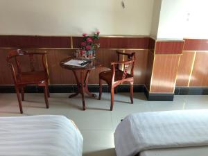 Postel nebo postele na pokoji v ubytování Hong Dao 2 Hotel