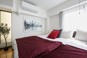 HOTEL AIS HATAGAYAにあるベッド