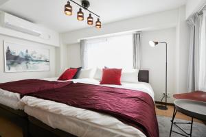 HOTEL AIS HATAGAYAにあるベッド