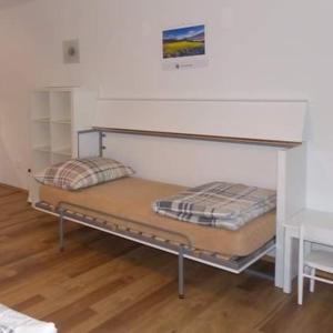 Postel nebo postele na pokoji v ubytování RIVIERA 510-2 Lipno - velký jednopokojový APT s terasou k jezeru