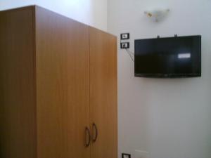 TV a/nebo společenská místnost v ubytování B&B Express
