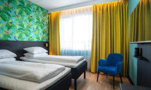 Postel nebo postele na pokoji v ubytování Thon Hotel Alta