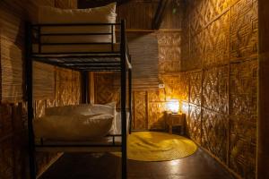 Postel nebo postele na pokoji v ubytování Amihan Beach Cabanas
