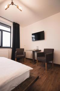 TV a/nebo společenská místnost v ubytování Sofia Hotel